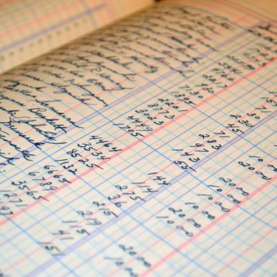 pexels photo 164686 164686 Close-up of a vintage handwritten ledger detailing financial records and accounts.